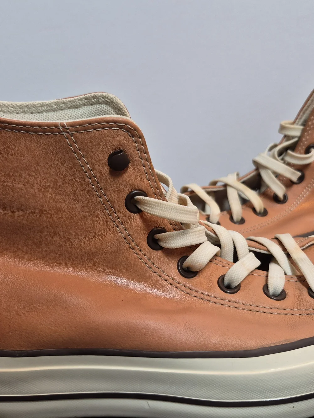 The Converse Chuck Taylor All Star Mid Top Leather Lace Up Sneakers in Brown/Whi